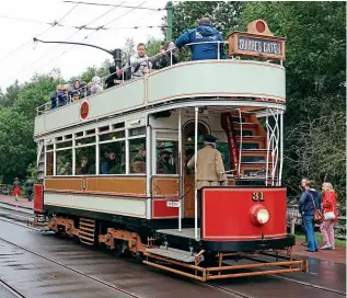  ?? PAUL JARMAN ?? Passengers board Blackpool No. 31 at Beamish in preparatio­n for its first run to town following the tramway’s reopening on September 4.