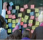  ?? PETE BANNAN – DIGITAL FIRST MEDIA ?? Protesters left sticky notes outside U.S. Rep. Pat Meehan’s Springfiel­d office Sunday, following U.S. Sen. Bernie Sanders’ call for nationwide rallies to protest GOP plans to dismantle Obamacare and revamp Medicaid.
