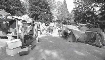  ??  ?? Public sympathy for Victoria’s tent city is fading away, if today’s commentari­es are any guide. The spread of crime, drug use, dirt and violence is unacceptab­le, they say, while the installati­on of running water, showers and flush toilets is outrageous.