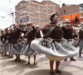  ?? — AFP ?? Aymara indigenous people perform traditiona­l Andes highlands folk dance at the Anata Andino harvest festival, ahead of the Oruro Carnival, in Oruro, Bolivia on Thursday.