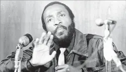  ?? Associated Press ?? ‘HE TAUGHT US HOW TO LAUGH’ Dick Gregory speaks at the University of South Florida in 1971. He used humor to call attention to issues ranging from police brutality to world famine.