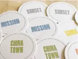  ?? Moontree ?? Rebecca Kutys’ company, Moontree Letterpres­s, offers a set of coasters that features five San Francisco districts: the Sunset, Mission, SoMa, North Beach and Chinatown. Kutys came up with the concept when she was living in New York City, and started...