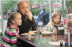  ?? K .C . Ba i l ey/ F X ?? Louie (Louis C.K.) is a divorced dad raising his daughters, Lilly (Hadley Delany) and Jane (Ursula Parker), in Louie.