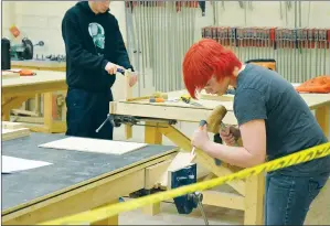  ?? NEWS PHOTO TIM KALINOWSKI ?? Hat High student Kat Darkow takes part Tuesday in the cabinet-making challenge during the South East Alberta Regional Skills Competitio­n at MHC.