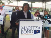  ?? Mark Zaretsky / Hearst Connecticu­t Media ?? New Haven Health Director Maritza Bond announces plans to explore a run for Secretary of State, speaking in Fair Haven's Criscuolo Park, surrounded by family and friends.