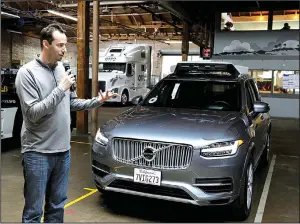  ?? AP/ ERIC RISBERG ?? head of Uber’s self- driving program, speaks about the company’s driverless car in San Francisco in December.