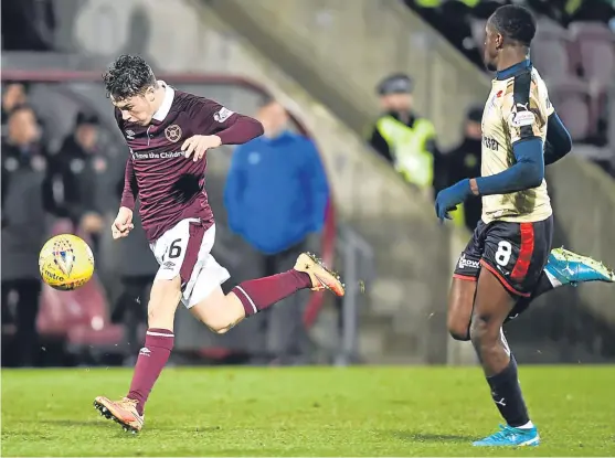  ?? Pictures: SNS Group. ?? Left: Esmael Goncalves beats Dundee goalkeeper Elliott Parish to open the scoring for Hearts; above: young Fifer Anthony McDonald, who made an impressive debut for the Tynecastle side.