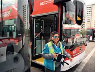  ?? ?? A driver in front of a China-made double-decker electric bus for the Pan American Games 2023 at a terminal in Santiago, Chile, on November 2