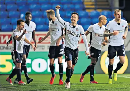  ??  ?? Breakthrou­gh: Zach Clough celebrates scoring the winner for Bolton