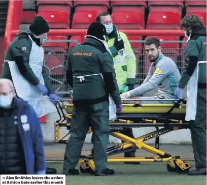  ??  ?? Alex Smithies leaves the action at Ashton Gate earlier this month