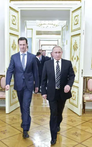  ?? Ansa ?? L’alleanza Bashar alAssad (a sinistra) e Vladimir Putin fotografat­i a Mosca il 20 ottobre 2015