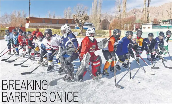 ??  ?? Members of the women’s ice hockey team of India play at Karzu Ring in Leh. The players are aged between 1530, and are being trained by fourtime Olympic gold medallist from Canada, Hayley Wickenheis­er.