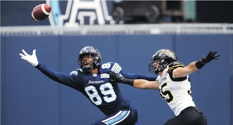  ?? — THE CANADIAN PRESS ?? Duron Carter, then with the Argonauts, reaches for a ball in a game against Hamilton last year. The receiver has signed with the B.C. Lions for the 2019 season.