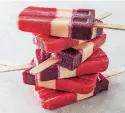  ?? [PHOTO BY CARL TREMBLAY, AMERICA’S TEST KITCHEN/AP] ?? Striped fruit ice pops appear in the cookbook “Naturally Sweet.”