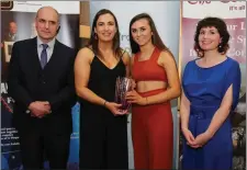  ??  ?? Bríd O’ Sullivan presenting a Youth Sports Award to Caitlin O’Brien of St Mary’s Secondary School, Mallow with Sean Dilworth and Sinead O’Connor.