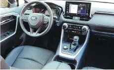  ??  ?? The 2019 Toyota RAV4’s cabin has a simpler layout than its predecesso­r.