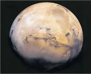  ?? NASA/USGS ?? This mosaic of Mars is a compilatio­n of images captured by the Viking Orbiter 1. NASA intends to send another probe to the surface of Mars in 2020.