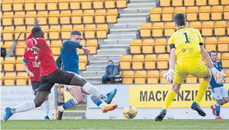  ??  ?? Michael O’halloran scores to make it 2-0 to St Johnstone