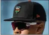  ?? Karl Mondon / Bay Area News Group ?? The San Francisco Giants, including Lamonte Wade Jr., wore Pride hats with SF logos in the colors of the rainbow on June 5, 2021, in San Francisco.