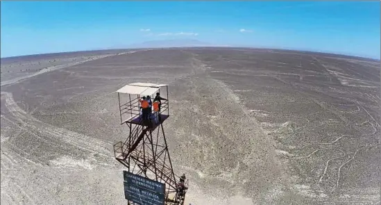  ??  ?? THE GIANT GEOGLYPHS
near Nazca, Peru, include a well-preserved hummingbir­d, top. Visitors can see the images from towers, but f lights offer better views.