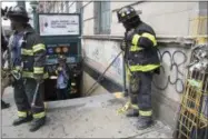  ?? MARY ALTAFFER — ASSOCIATED PRESS ?? Emergency service personnel work at the scene of a subway derailment, Tuesday, June 27, 2017, in the Harlem neighborho­od of New York.