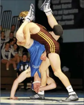  ?? KIRK NEIDERMYER - FOR DIGITAL FIRST MEDIA ?? Governor Mifflin’s Kyle Seibert up ends Exeter’s Chris Matthews at Exeter High School in Exeter Township on Wednesday, Dec. 14.