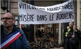  ?? French region. Photograph: Philippe Lopez/AFP/Getty Images ?? Wine growers demonstrat­ing last December in Bordeaux over the loss of viticultur­e in the