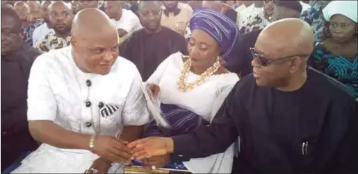  ?? L-R: Senator Ifeanyi Araraume, his wife, Gladys, and former Governor of Abia State, Senator T. A. Orji, at the burial ceremony ??