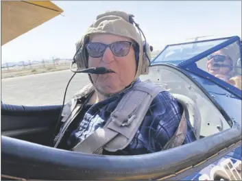  ?? ?? CLIFF UPDIKE, 101, IN THE COCKPIT of a restored World War II-era biplane. The Yuma resident experience­d the magic of a free Dream Flight on April 25.