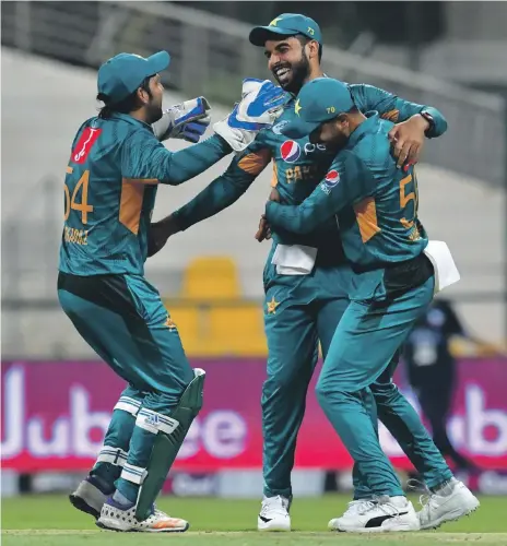  ?? AFP ?? New Zealand faltered in their chase in Abu Dhabi on Wednesday after the departure of Colin Munro, top, allowing Pakistan to go one-up in the three-match Twenty20 internatio­nal series