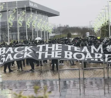  ??  ?? 0 Celtic fans protest outside Parkhead before a match against Kilmarnock earlier this month.