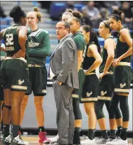  ?? Jessica Hill / AP ?? Coach Jose Fernandez’s South Florida team has been decimated by injuries. The Bulls will be without three of their top four scorers when they visit UConn on Sunday.