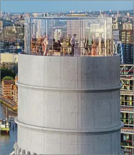  ??  ?? Up and away: an artist’s impression of the cylindrica­l glass lift at Battersea Power Station. Below, the glass elevator in Charlie And The Chocolate Factory