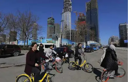  ?? EPA PIC ?? China’s property sales surged in the first two months of they year despite government measures to cool the market, though growth in real estate investment is showing signs of easing.