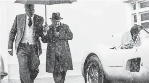  ?? ?? Driver, left, plays Enzo Ferrari in “Ferrari,” which focuses on a tense time in 1957 when the famed automaker was having financial and marital problems.