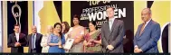  ??  ?? Kalutara New Philip Hospital Chairperso­n and Managing Director Indrani Fernando receives the award from officials