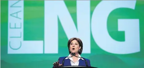  ?? DARRYL DYCK/THE CANADIAN PRESS ?? Christy Clark addresses the LNG in B.C. Conference in Vancouver in October 2015. Mothballed and indefinite­ly delayed plans for LNG plants have taken a bite out of property values and municipal assessment­s in towns like Kitimat.