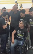  ?? Photo contribute­d by Charman Putnam ?? Coosa High graduate Fernando Guzman (center) laughs with his friends as they are joined by Dwayne Johnson, The Rock.