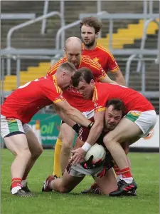  ??  ?? Conor Carty of Castletown is surrounded by Starlights quartet Rory O’Connor, Tom Wall, Jack Kelly and Kevin Foley.