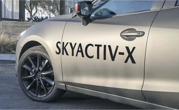  ??  ?? Mazda’s new Skyactiv-X engine, which uses a variant of the homogeneou­s charge controlled ignition engine, promises improved fuel efficiency.