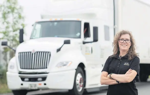  ?? THE CANADIAN PRESS ?? Vivianne Carbonneau, who has been hauling freight for two years, hopes to encourage more women to enter the trucking industry, which she admits is a “guys’ culture.”