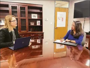  ?? CT Department of Public Health / Contribute­d photo ?? Lori Mathieu, Department of Public Health public health section chief, discusses the state’s lead-abatement plans with Commission­er Manisha Juthani.