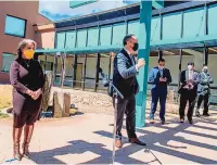  ?? ROBERTO E. ROSALES/JOURNAL ?? Gov. Michelle Lujan Grisham, left, joins second gentleman Douglas Emhoff as he promotes the American Rescue Plan during a trip to New Mexico on Wednesday.