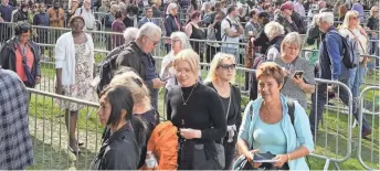  ?? MARTIN MEISSNER/AP ?? People queue at the start of the more than four-mile long line near Tower Bridge to pay their respect to the late Queen Elizabeth II on Thursday in London.