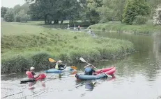  ??  ?? Navigating the river