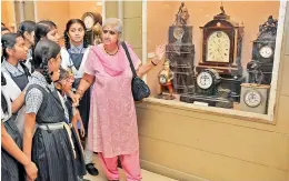  ?? — DC ?? Intach, Hyderabad Chapter, convenor P. Anuradha explains to visitors the antique clocks at the Special Historic Clock Collection housed in the Salar Jung Museum, Hyderabad, on Saturday.