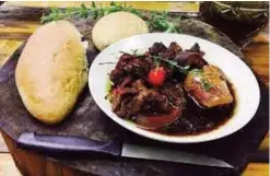  ?? ?? Pepper pot – a popular holiday meat stew in Guyana and the rest of the Caribbean simmered slow and low in a dark rich gravy flavored with cinnamon, brown sugar and cassareep that makes the dish get better over the time. Uniquely appetizing!