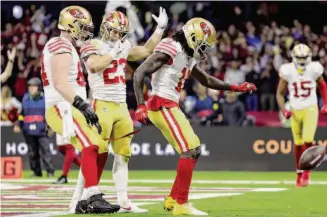  ?? Sean M. Haffey/Getty Images ?? Brandon Aiyuk (11) shimmies after catching a touchdown pass against Arizona on Monday night.