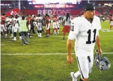  ?? Ross D. Franklin / Associated Press ?? Sebastian Janikowski has been a Raider since being drafted in 2000. His status for Sunday’s game in Tennessee is unclear over a reported contract dispute.