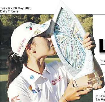  ?? Harry How/agence france-presse ?? PAJAREE Anannaruka­rn of Thailand kisses the winner’s trophy on day five of the Bank of Hope LPGA Match-Play presented by MGM Rewards at Shadow Creek Golf Course in Las Vegas, Nevada on Sunday.